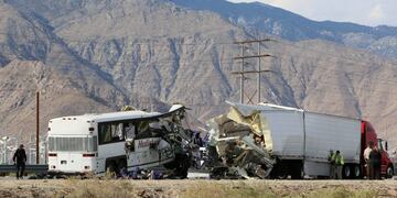 Investigators confer at the scene of a mass casualty bus crash on the westbound Interstate 10 freeway near Palm Springs, California October 23, 2016. REUTERS/Sam Mircovich