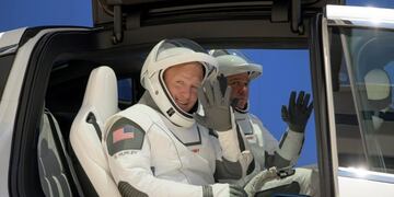 NASA astronauts Douglas Hurley, left, and Robert Behnken, wearing SpaceX spacesuits, depart the Neil A\u002E Armstrong Operations and Checkout Building for Launch Complex 39A during a dress rehearsal prior to the Demo-2 mission launch, Saturday, May 23, 2020, at NASA's Kennedy Space Center in Cape Canaveral, Fla\u002E The SpaceX Falcon 9 rocket, that will send two astronauts to the International Space Station for the first crewed flight from the U\u002ES\u002E in nearly a decade\u002E, is scheduled for launch on Wednesday, May 27\u002E (Bill Ingalls/NASA via AP)