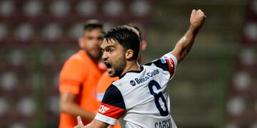 Matias Caruzzo of Argentina's San Lorenzo, celebrates after scoring against Venezuela's Deportivo La Guaira, during their Copa Sudamericana 2016 football match held  at the Metropolitano stadium in Barquisimeto, Venezuela, on September 29, 2016. / AFP PHOTO / FEDERICO PARRA venezuela Barquisimeto Matias Caruzzo futbol copa sudamericana 2016 futbolistas partido deportivo la guaira vs san lorenzo