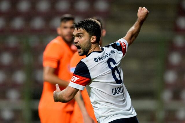 Matias Caruzzo of Argentina's San Lorenzo, celebrates after scoring against Venezuela's Deportivo La Guaira, during their Copa Sudamericana 2016 football match held  at the Metropolitano stadium in Barquisimeto, Venezuela, on September 29, 2016. / AFP PHOTO / FEDERICO PARRA venezuela Barquisimeto Matias Caruzzo futbol copa sudamericana 2016 futbolistas partido deportivo la guaira vs san lorenzo