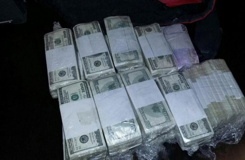 En un allanamiento por estafas, la Policía encontró enterrados en un patio u$s 63 mil y $ 100 mil
