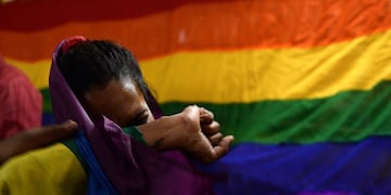 An Indian member and supporters of the lesbian, gay, bisexual, transgender (LGBT) community cries as she celebrates the Supreme Court decision to strike down a colonial-era ban on gay sex, in Chennai on September 6, 2018\u002E - India's Supreme Court on September 6 struck down the ban that has been at the centre of years of legal battles\u002E \
