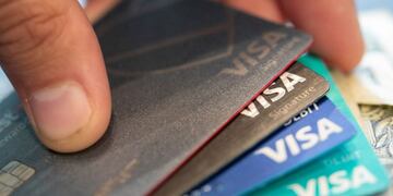 FILE - This Aug\u002E 11, 2019 file photo shows Visa credit cards in New Orleans\u002E In the current economic crisis, some consumers will seek debt relief when their obligations become overwhelming\u002E If the Great Recession is any indicator, that means more consumers will turn to debt settlement, a risky debt relief option, rather than credit counseling, which keeps them in good standing with creditors\u002E  (AP Photo/Jenny Kane, File)