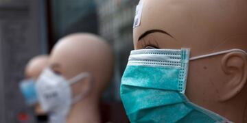 Masks are displayed at a general store, during the outbreak of the coronavirus disease (COVID-19), in the Kreuzberg district of Berlin, Germany, April 3, 2020\u002E REUTERS/Michele Tantussi