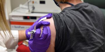 FILE - This May 4, 2020, file photo provided by the University of Maryland School of Medicine, shows the first patient enrolled in Pfizer's COVID-19 coronavirus vaccine clinical trial at the University of Maryland School of Medicine in Baltimore\u002E  On Monday, Nov\u002E 9, 2020, Pfizer said an early peek at its vaccine data suggests the shots may be 90% effective at preventing COVID-19\u002E (Courtesy of University of Maryland School of Medicine via AP, File)