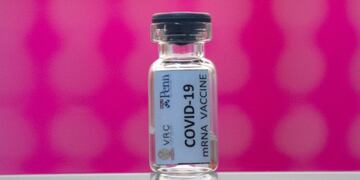 FILE - In this Monday, May 25, 2020 file photo, a vile of a COVID-19 vaccine candidate on a shelf during testing at the Chula Vaccine Research Center, run by Chulalongkorn University in Bangkok, Thailand\u002E Refrigeration, cargo planes, and, above all, money: All risk being in short supply for the international initiative to get coronavirus vaccines to the world’s most vulnerable people\u002E (AP Photo/Sakchai Lalit, File)
