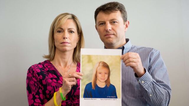(FILES) In this file picture taken on May 2, 2012 parents of missing girl Madeleine McCann, Kate (L) and Gerry McCann (R) pose with an artist's impression of how their daughter might look now at the age of nine ahead of a press conference in central Londo