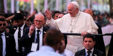 Pope Francis waves during his arrival to attend a program meeting with young people at Notre Dame College in Dhaka, Bangladesh, Saturday, Dec\u002E 2, 2017\u002E (AP Photo/A\u002E M\u002E Ahad)