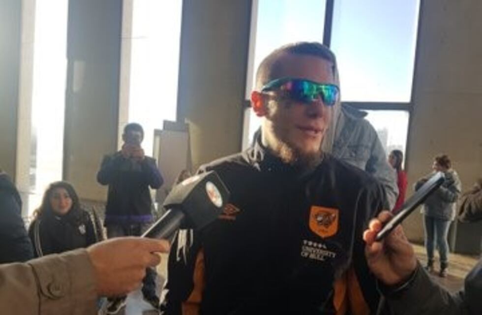 Los hermanos Caniggia, a puras fotos... en Tribunales de Córdoba