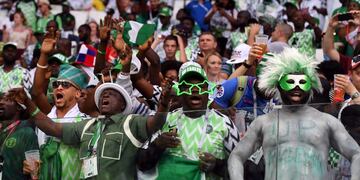 Nigeria's fans celebrate their victory at the end of during the Russia 2018 World Cup Group D football match between Nigeria and Iceland at the Volgograd Arena in Volgograd on June 22, 2018\u002E / AFP PHOTO / Mark RALSTON / RESTRICTED TO EDITORIAL USE - NO MOBILE PUSH ALERTS/DOWNLOADS