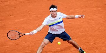 Leonardo Mayer of Argentina plays a return against Jan-Lennard Struff of Germany in the men's singles at the Tennis ATP-Tour German Open in Hamburg, Germany, Thursday, July 27, 2017\u002E (Daniel Bockwoldt/dpa via AP)
