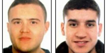 A combo of handout images released by the Catalan regional police \