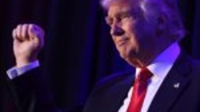 AFP PICTURES OF THE YEAR 2016nUS President-elect Donald Trump arrives at the New York Hilton Midtown in New York on November 8, 2016. nTrump stunned America and the world Wednesday, riding a wave of populist resentment to defeat Hillary Clinton in the race to become the 45th president of the United States. / AFP PHOTO / SAUL LOEB