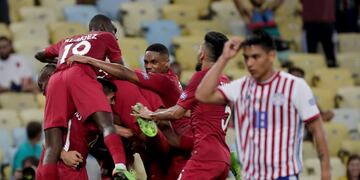 Qatar players celebrate their side's second goal against Paraguay, scored by Boualem Khoukhi, during a Copa America Group B soccer match at the Maracana stadium in Rio de Janeiro, Brazil, Sunday, June 16, 2019\u002E (AP Photo/Silvia Izquierdo)