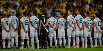 Players of Argentina listen to the national anthems before their Copa America football tournament semi-final match against Brazil at the Mineirao Stadium in Belo Horizonte, Brazil, on July 2, 2019\u002E (Photo by Pedro UGARTE / AFP)