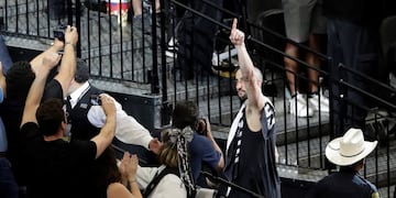San Antonio Spurs guard Manu Ginobili (20) signals to fans as he walks off the court after Game 4 of the NBA basketball Western Conference finals against the Golden State Warriors, Monday, May 22, 2017, in San Antonio. Golden State won 129-115. (AP Photo/Eric Gay)