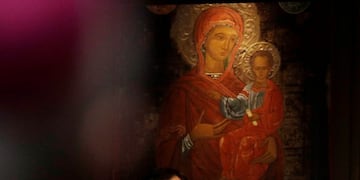 Pope Francis lifts the Holy Book as he meets the bishops of the Italian Episcopal Conference, at the Vatican Monday, May 22, 2017. (AP Photo/Alessandra Tarantino)