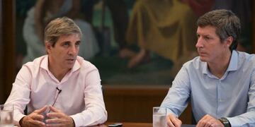 Santiago Bausili y Luis Caputo