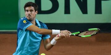 Guido Pella busca consolidar la venta de Argentina ante Colombia en la Copa Davis (TyC Sports)\u002E Foto: Andres Larrovere/AFP\u002E