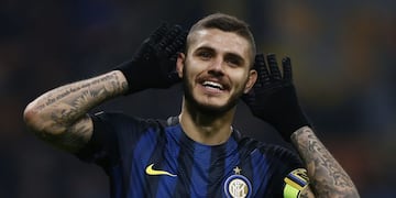 Inter Milan's forward Mauro Emanuel Icardi from Argentina celebrates after scoring during the Italian Serie A football match Inter Milan Vs Crotone on November 6, 2016 at the 'San Siro Stadium' in Milan. / AFP PHOTO / MARCO BERTORELLO