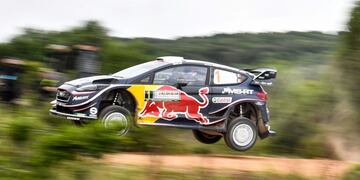 TOPSHOT - French driver Sebastien Ogier and co-driver Julien Ingrassia drive their Ford Fiesta WRC, during the shakedown stage of the 2018 FIA World Rally Championship, on June 7, 2018 at Olmedo village near Alghero city, in Sardinia\u002E / AFP PHOTO / Andreas SOLARO sardinia italia  carrera rally mundial campeonato automovilismo piloto pilotos en carrera