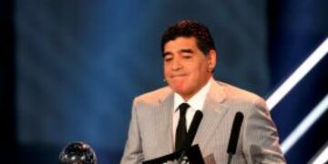 Football Soccer - FIFA Awards Ceremony - Men's Coach Award - Zurich, Switzerland - 09/01/17. Diego Armando Maradona presents the award. REUTERS/Ruben Sprich