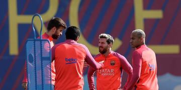 From left to right: FC Barcelona's Gerard Pique, Luis Suarez, Lionel Messi and Neymar attend a training session at the Sports Center FC Barcelona Joan Gamper in Sant Joan Despi, Spain, Friday, Oct. 14, 2016. (AP Photo/Manu Fernandez)