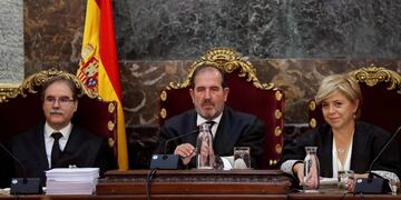 Spain's Supreme Court judges Andres Martinez Arrieta (C), Andres Palomo (L) y Ana Ferrer (R) pose in Madrid on June 21, 2019, on the day the court will examine a case so controversial it sparked mass protests after five men accused of gang-raping a woman were convicted of the lesser crime of sexual abuse\u002E - The men were accused of raping the woman, then aged 18, at the entrance to an apartment building in Pamplona on July 7, 2016, at the start of the popular week-long San Fermin bull-running festival\u002E The five filmed the incident with their smartphones and then bragged about it on WhatsApp where they referred to themselves as \