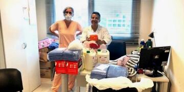 Trabajo en equipo para ayudar al personal de Salud con barbijos y camisolines\u002E (Web)\u002E