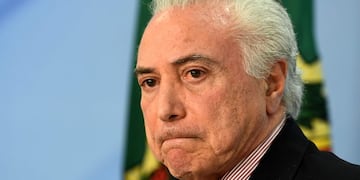 Michel Temer anunciando a Ivan Monteiro como nuevo presidente de Petrobras (AFP)\u002E