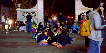 People outside their houses are seen along a street after an earthquake in Coquimbo, Chile  January 19, 2019\u002E Picture taken January 19, 2019\u002E REUTERS/Alejandro Pizarro NO RESALES\u002E NO ARCHIVES\u002E