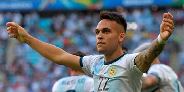 Argentina's Lautaro Martinez celebrates after scoring against Qatar during their Copa America football tournament group match at the Gremio Arena in Porto Alegre, Brazil, on June 23, 2019\u002E (Photo by Carl DE SOUZA / AFP)