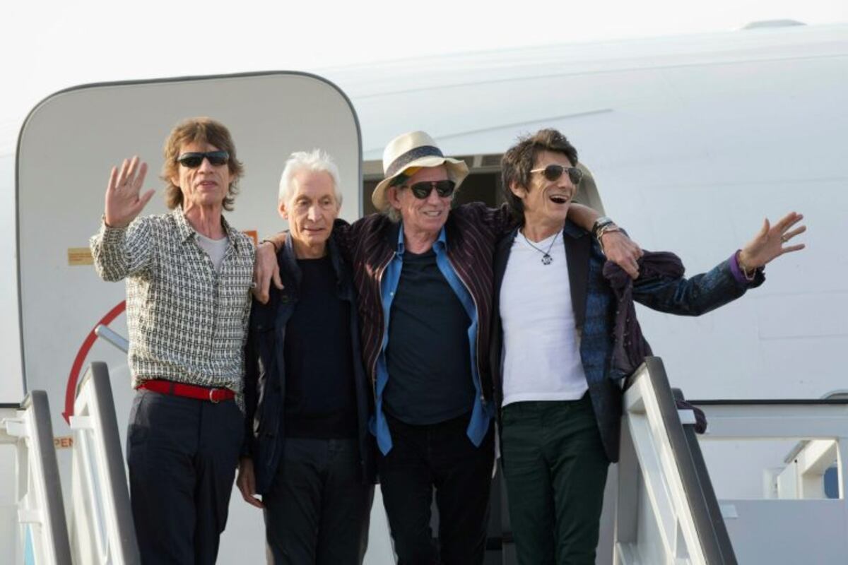 FILE - In this March 24, 2016 file photo, members of The Rolling Stones, from left, Mick Jagger, Charlie Watts, Keith Richards and Ron Wood pose for photos from their plane at Jose Marti international airport in Havana, Cuba\u002E The Rolling Stones are threatening U\u002ES\u002E President Donald Trump with legal action for using their songs at his reelection campaign rallies despite cease-and-desist directives, according to a statement issued by the band Sunday June 28, 2020\u002E (AP Photo/Ramon Espinosa File)