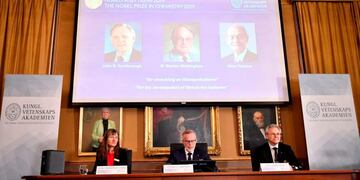 Goran K Hansson (C), Secretary General of the Royal Swedish Academy of Sciences, and academy members Sara Snogerup Linse (L) and Olof Ramstrom, announce the winners  of the 2019 Nobel Prize in Chemistry (Up L-R) John Goodenough of US, Britain's Stanley Whittingham and Japan's Akira Yoshino during a news conference at the Royal Swedish Academy of Sciences in Stockholm, Sweden, on October 9, 2019\u002E - John Goodenough of US, Britain's Stanley Whittingham and Japan's Akira Yoshino won the 2019 Nobel Chemistry Prize for the development of lithium-ion batteries, the Royal Swedish Academy of Sciences said\u002E\n\