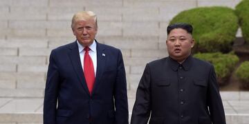 President Donald Trump, left, meets with North Korean leader Kim Jong Un at the North Korean side of the border at the village of Panmunjom in Demilitarized Zone, Sunday, June 30, 2019\u002E (AP Photo/Susan Walsh)