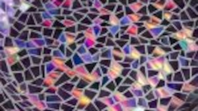 Posa platos con cds.