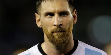 In this March 23, 2017 Argentina's Lionel Messi leaves the pitch at the end of a World Cup qualifying match against Chile in Buenos Aires, Argentina. Messi has been banned from Argentina's next four World Cup qualifiers, starting with the Tuesday, March 28, 2017 game in Bolivia, for