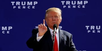 Republican presidential nominee Donald Trump takes the satge for a rally at a car dealership in Portsmouth, New Hampshire, U.S. October 15, 2016. REUTERS/Jonathan Ernst TPX IMAGES OF THE DAY