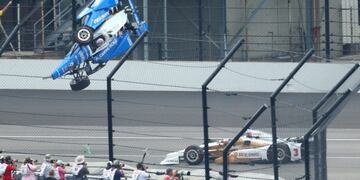 May 28, 2017; Indianapolis, IN, USA; IndyCar Series driver Scott Dixon (9) goes airborne and crashes in front of Helio Castroneves (3) during the 101st Running of the Indianapolis 500 at Indianapolis Motor Speedway. Mandatory Credit: Mark J. Rebilas-USA TODAY Sports TPX IMAGES OF THE DAY