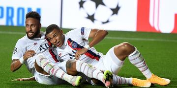 PSG's Neymar, left, celebrates with Kylian Mbappe after teammate Eric Maxim Choupo-Moting scored his team's second goal during the Champions League quarterfinal match between Atalanta and PSG at Luz stadium, Lisbon, Portugal, Wednesday, Aug\u002E 12, 2020\u002E (David Ramos/Pool Photo via AP)