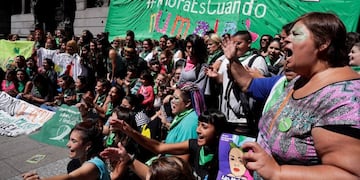 Activists shout pro-abortion slogans outside of Congress after the presentation of the abortion bill in Buenos Aires, Argentina, Tuesday, March 6, 2018\u002E The banner in the background reads in Spanish \