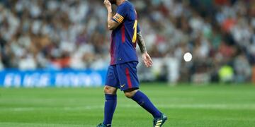 Barcelona's Lionel Messi walks along the pitch during the Spanish Super Cup second leg soccer match between Real Madrid and Barcelona at the Santiago Bernabeu Stadium in Madrid, Wednesday, Aug\u002E 16, 2017\u002E Real Madrid won 5-1 on aggregate\u002E (AP Photo/Francisco Seco)