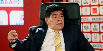 FILE - In this May 4, 2015, file photo, Argentina football legend Diego Maradona speaks on the second day of the SoccerEx Asian Forum conference in Southern Shuneh, Jordan. Maradona urged fellow Argentines on Wednesday, June 29, 2016, to leave Lionel Messi alone over the current staru2019s decision to retire from Argentinau2019s national team following its loss to Chile in the Copa America championship match. (AP Photo/Raad Adayleh, File) jordania shuneh diego maradona foro del futbol SoccerEx Asian conferencia exfutbolista