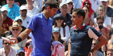 Argentina's Juan Martin del Potro, left, and Spain's Nicolas Almagro talk during their second round match of the French Open tennis tournament at the Roland Garros stadium, in Paris, France. Thursday, June 1, 2017. (AP Photo/David Vincent)