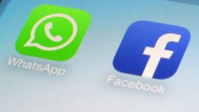 FILE - This Feb. 19, 2014, file photo, shows WhatsApp and Facebook app icons on a smartphone in New York. Global messaging service WhatsApp says it will start sharing the phone numbers of its users with Facebook, its parent company. That means WhatsApp us