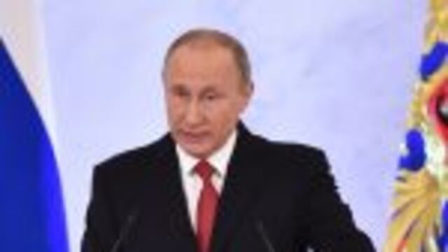 (FILES) This file photo taken on December 1, 2016 shows Russian President Vladimir Putin addressing the Federal Assembly of both houses of parliament at the Kremlin in Moscow.nVladimir Putin was the world's most powerful person for a fourth straight year in 2016, with US president-elect Donald Trump in second place, Forbes magazine said December 14, 2016 in its annual rankings.