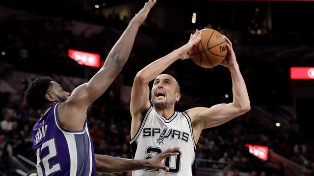 San Antonio Spurs guard Manu Ginobili (20) shoots over Sacramento Kings guard Tyreke Evans (32) during the second half of an NBA basketball game, Wednesday, March 8, 2017, in San Antonio. The Spurs won 114-104. (AP Photo/Eric Gay)