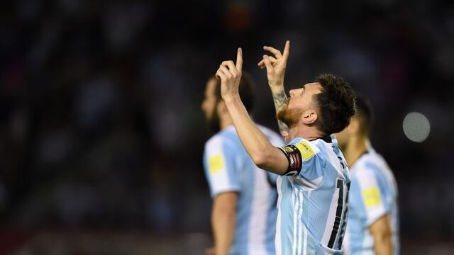 Argentina's Lionel Messi celebrates after scoring against Chile during their 2018 FIFA World Cup qualifier football match at the Monumental stadium in Buenos Aires, Argentina, on March 23, 2017. / AFP PHOTO / EITAN ABRAMOVICH