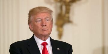 WASHINGTON, DC - MAY 12: U.S. President Donald Trump hosts an event for military mothers on National Military Spouse Appreciation Day with is wife, first lady Melania Trump, in the East Room of the White Hosue May 12, 2017 in Washington, DC. The U.S. Marine Chamber Orchestra and the U.S. Army Chors performed patriotic music for the invited guests two days before Mother's Day.   Chip Somodevilla/Getty Images/AFPn== FOR NEWSPAPERS, INTERNET, TELCOS & TELEVISION USE ONLY ==