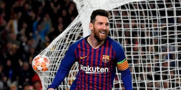 TOPSHOT - Barcelona's Argentinian forward Lionel Messi celebrates after scoring a goal during the UEFA Champions League semi-final first leg football match between Barcelona and Liverpool at the Camp Nou Stadium in Barcelona on May 1, 2019\u002E (Photo by LLUIS GENE / AFP)